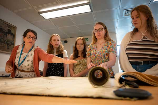 A group of students studying history