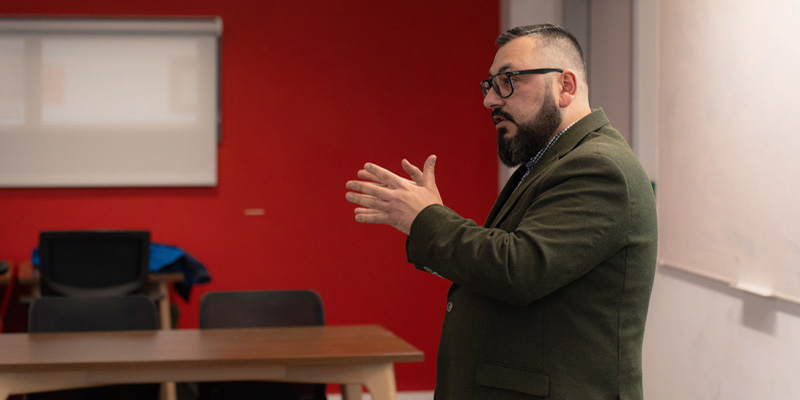 An academic at York delivering a seminar.