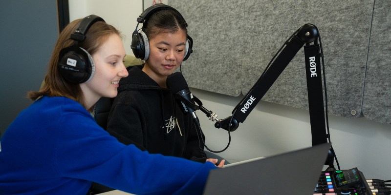 Students in the podcast studio